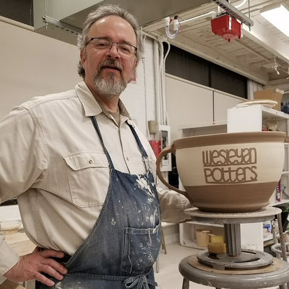 John Lipsky with large mug